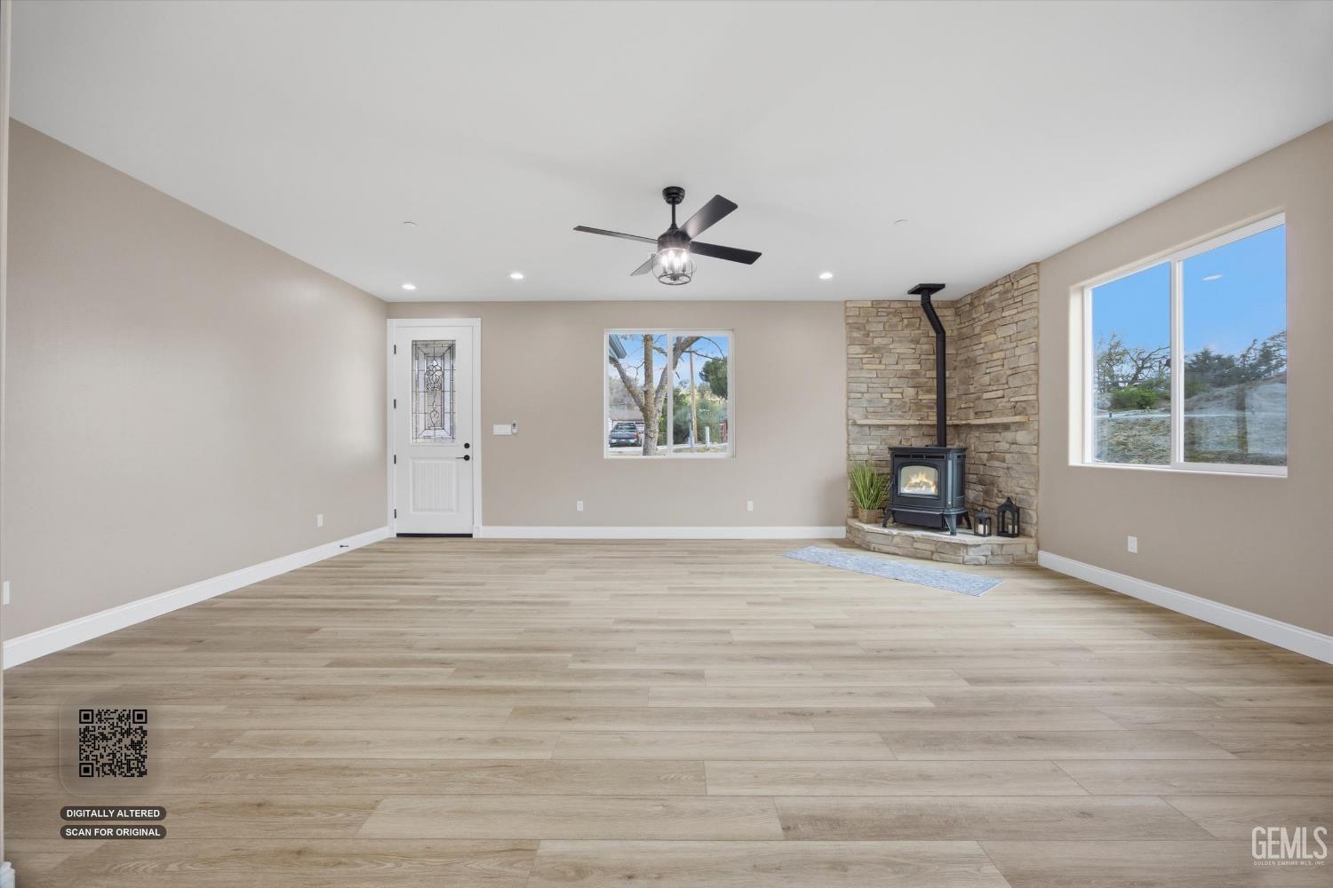 Undisclosed Address Tehachapi, CA 93561 - Photo 13 of 47 wooden floor in an empty room with a window