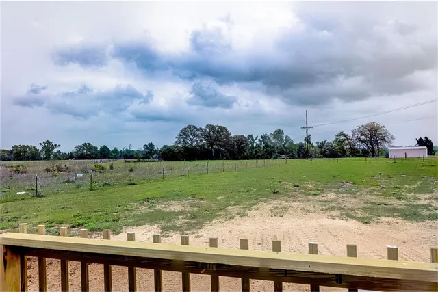 a view of a lake from a yard