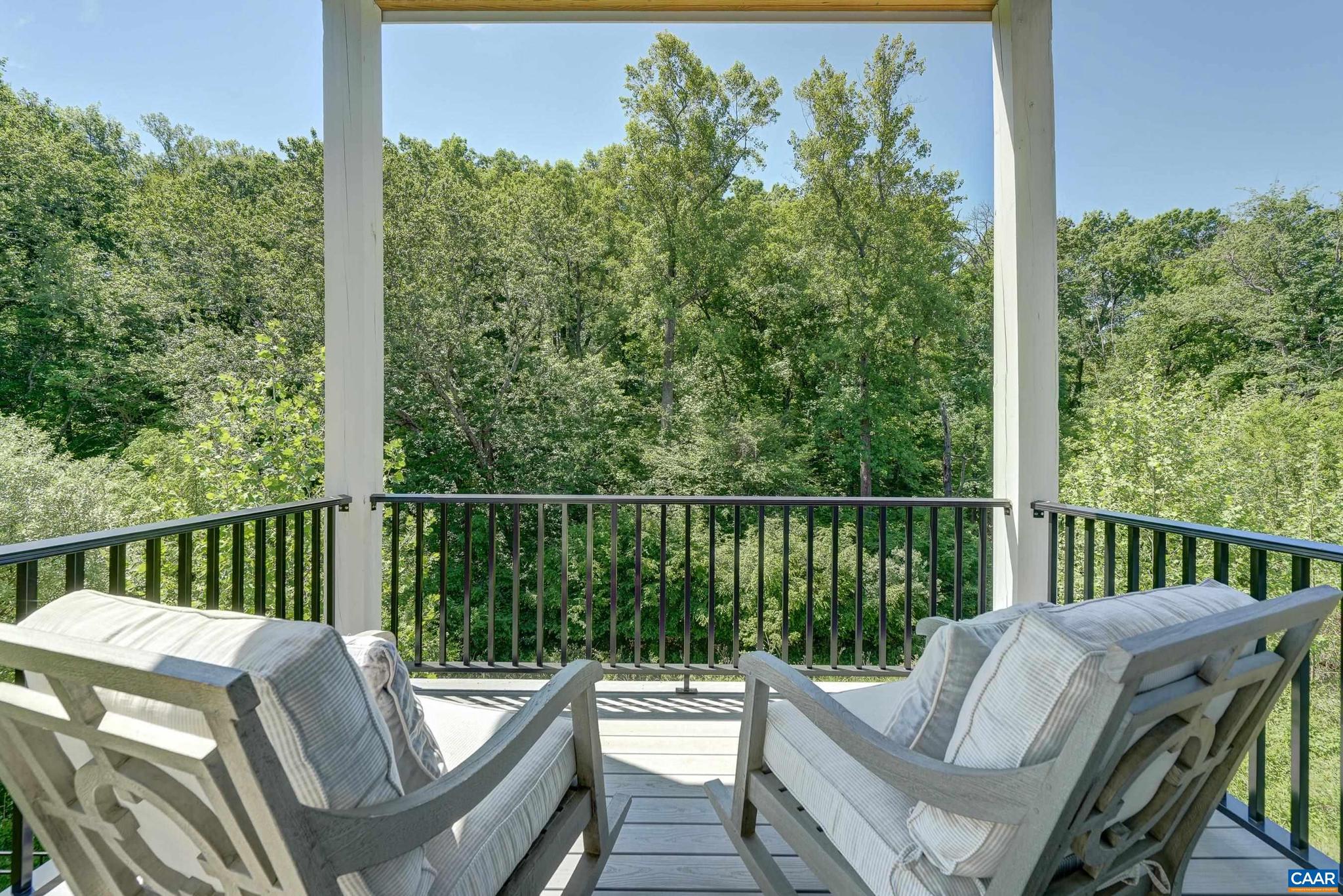 3327 Rowcross Street Crozet, VA 22932 - Photo 49 of 63 a view of a chair and table on the balcony