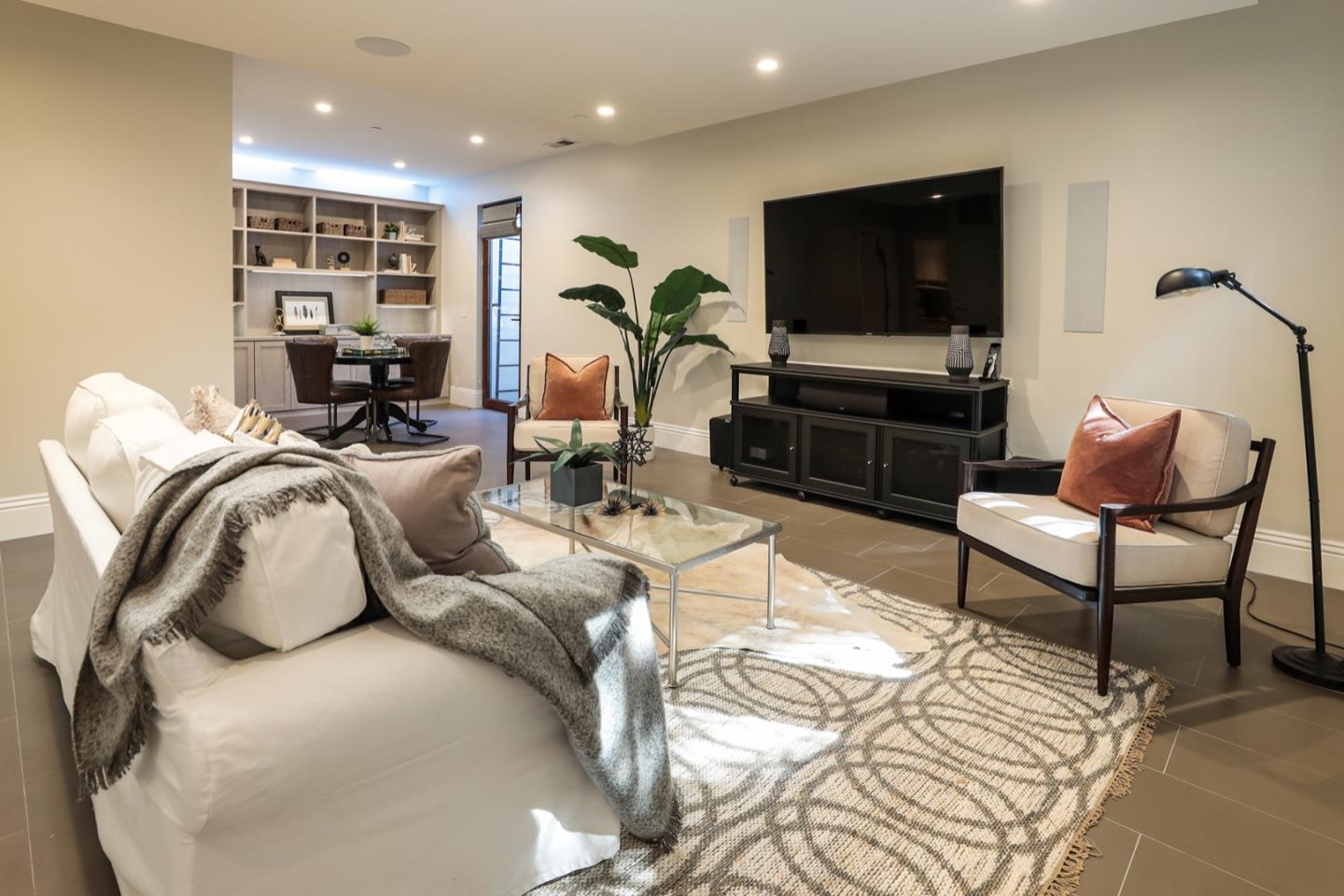 319 Walsh Road Atherton, CA 94027 - Photo 14 of 28 a living room with furniture and a flat screen tv