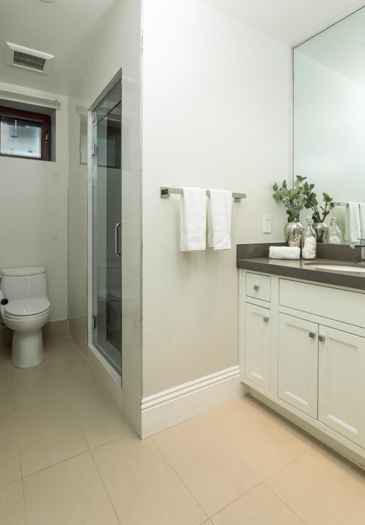 319 Walsh Road Atherton, CA 94027 - Photo 17 of 28 a bathroom with a sink and a mirror