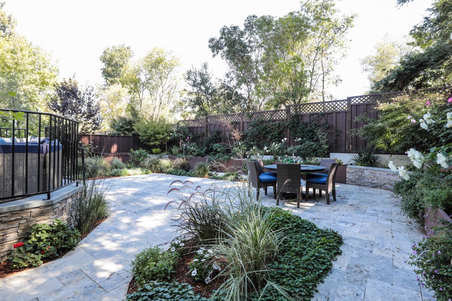 319 Walsh Road Atherton, CA 94027 - Photo 22 of 28 a view of a dinning table and chairs in the garden