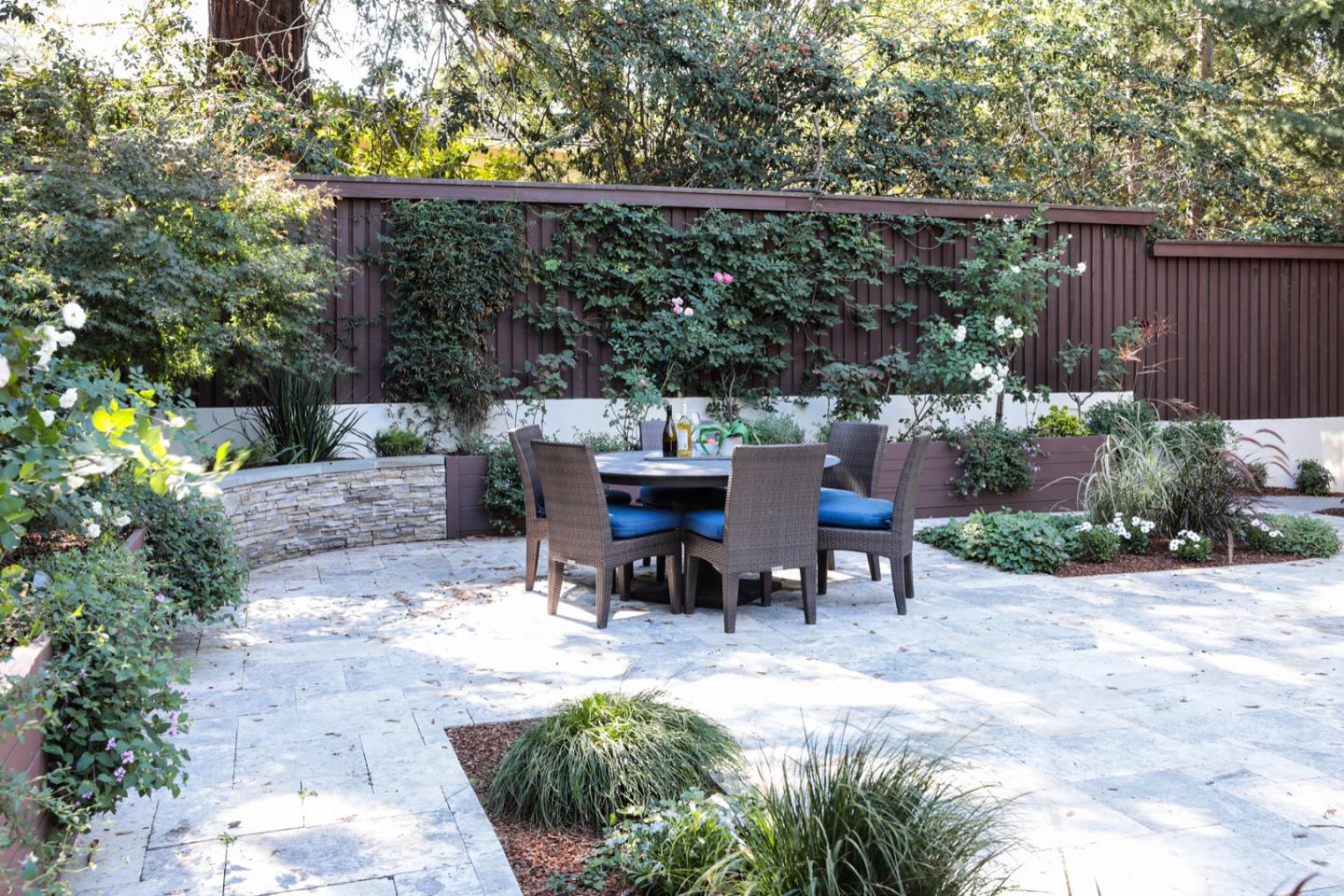 319 Walsh Road Atherton, CA 94027 - Photo 25 of 28 a view of a tables and chairs in a backyard