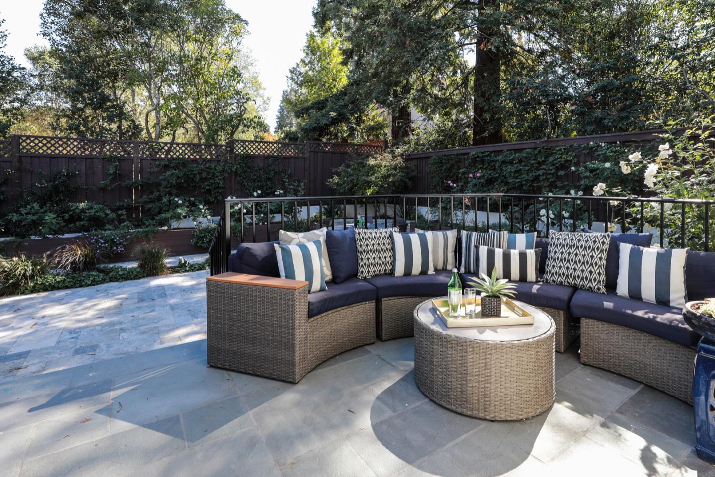 319 Walsh Road Atherton, CA 94027 - Photo 26 of 28 a view of a patio with couches and a fire pit