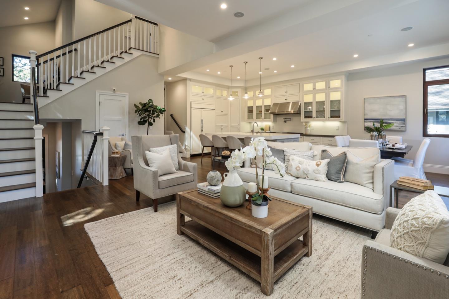 319 Walsh Road Atherton, CA 94027 - Photo 6 of 28 a living room with furniture kitchen view and a wooden floor