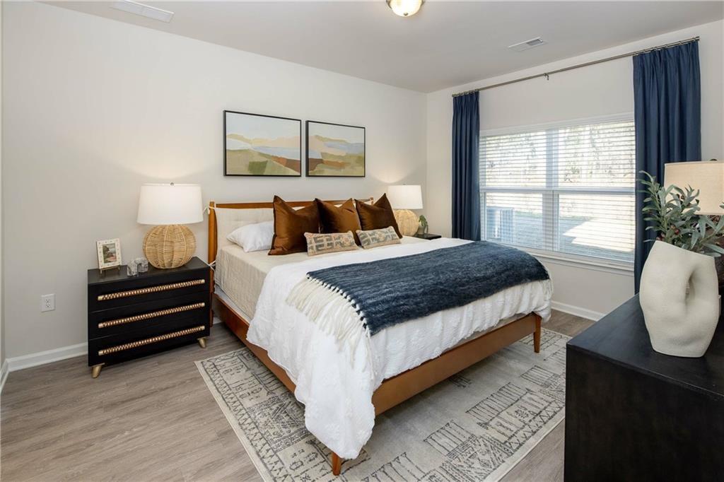 101 Walker Ridge Lane, Unit CARAWAY Cartersville, GA 30120 - Photo 31 of 40 a bedroom with a bed and window