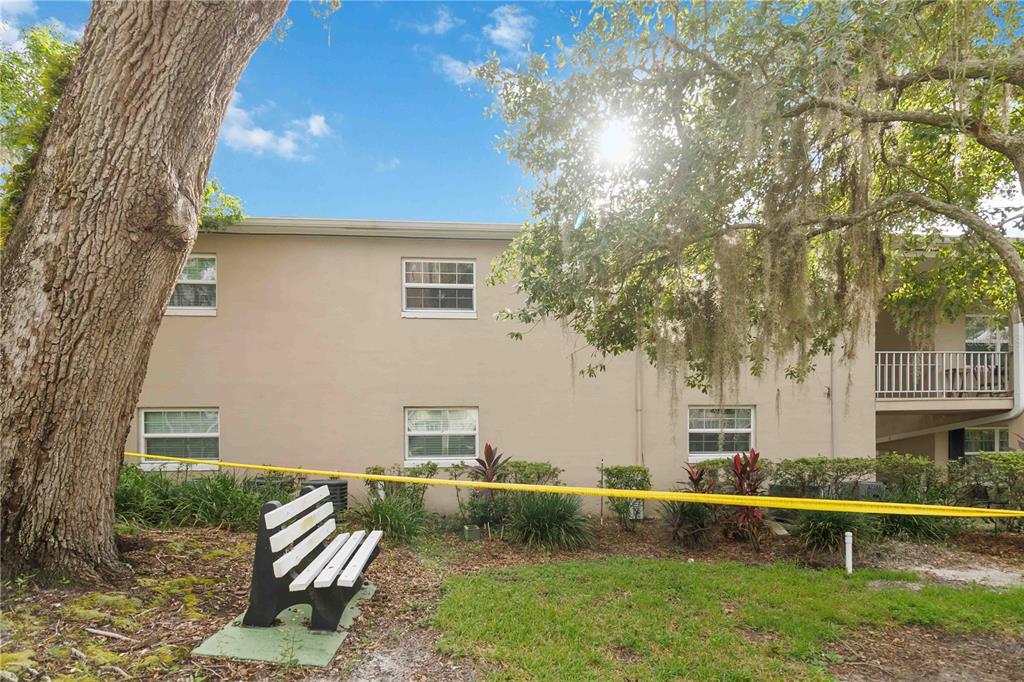 2500 Lee Road, Unit 244 Winter Park, FL 32789 - Photo 4 of 26 a front view of a house with garden