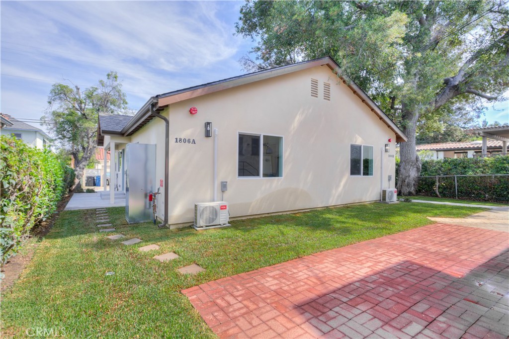 1806 South 8th Street, Unit A Alhambra, CA 91803 - Photo 2 of 23 a view of a backyard with plants and large tree