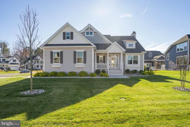 a front view of a house with swimming pool