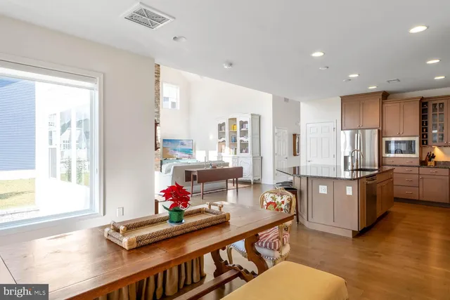 a room with furniture cabinets and window