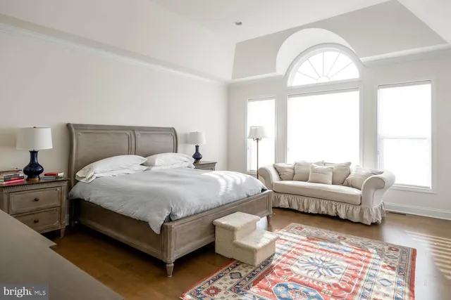 a view of a storage and utility room with washer and dryer