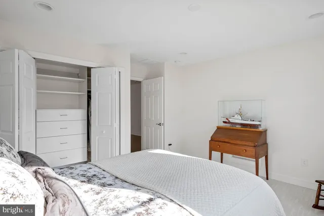 a front view of house with yard and swimming pool