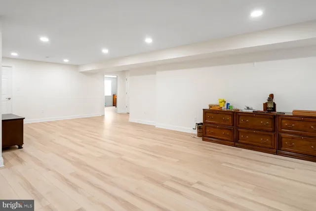 a room with gym equipment and windows