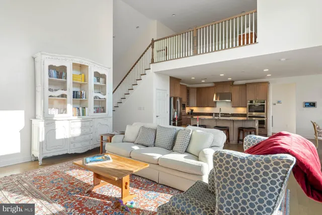 a stove top oven sitting inside of a kitchen