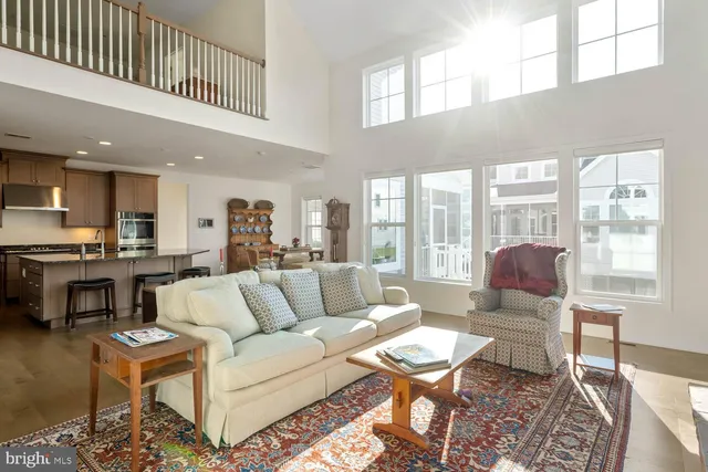 a kitchen with counter space dining table and chairs