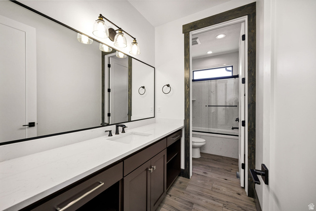 300 Knoll Loop, Unit 227 Fish Haven, ID 83287 - Photo 21 of 56 Full bathroom with vanity, combined bath / shower with glass door, light wood finished floors, and recessed lighting