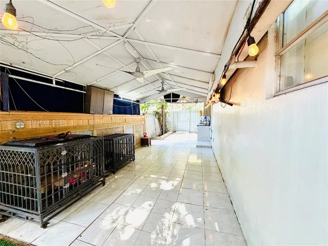 a view of a balcony with door