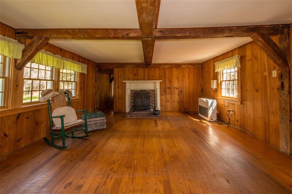 49 Adams Pond Road Boothbay, ME 04537 - Photo 12 of 25 The family room, with knotty pine...