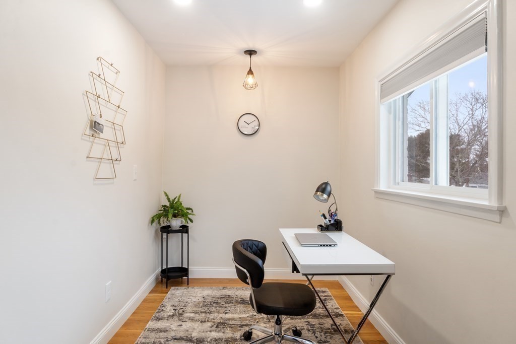 51 Donna Road Newton, MA 02459 - Photo 13 of 30 a view of a workspace with furniture and a window