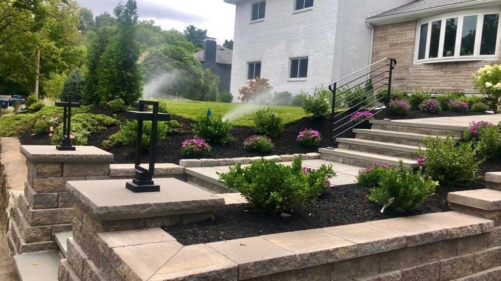 51 Donna Road Newton, MA 02459 - Photo 2 of 30 a view of a patio with table and chairs potted plants and large tree