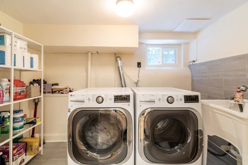 51 Donna Road Newton, MA 02459 - Photo 26 of 30 a utility room with dryer and washer