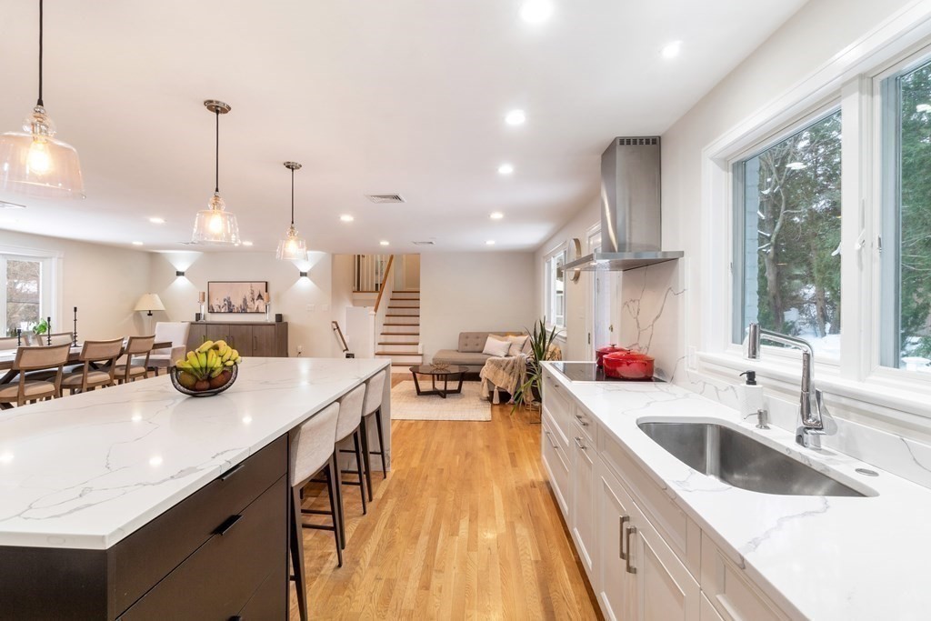 51 Donna Road Newton, MA 02459 - Photo 5 of 30 a kitchen with counter top a sink a stove and cabinets