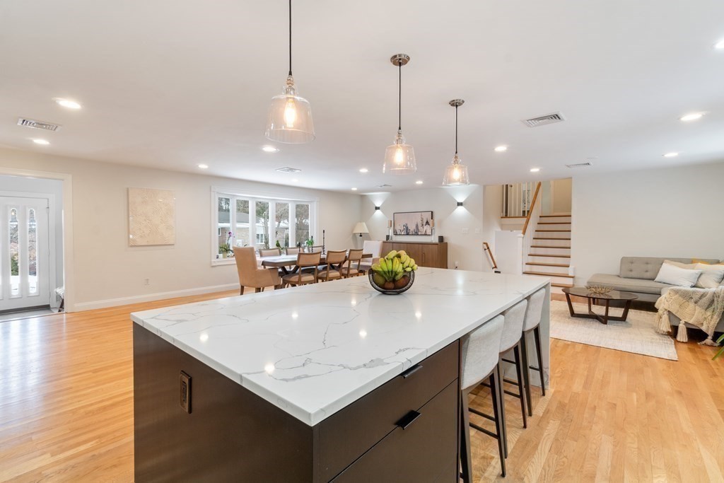 51 Donna Road Newton, MA 02459 - Photo 6 of 30 a kitchen with a sink a counter space and living room view