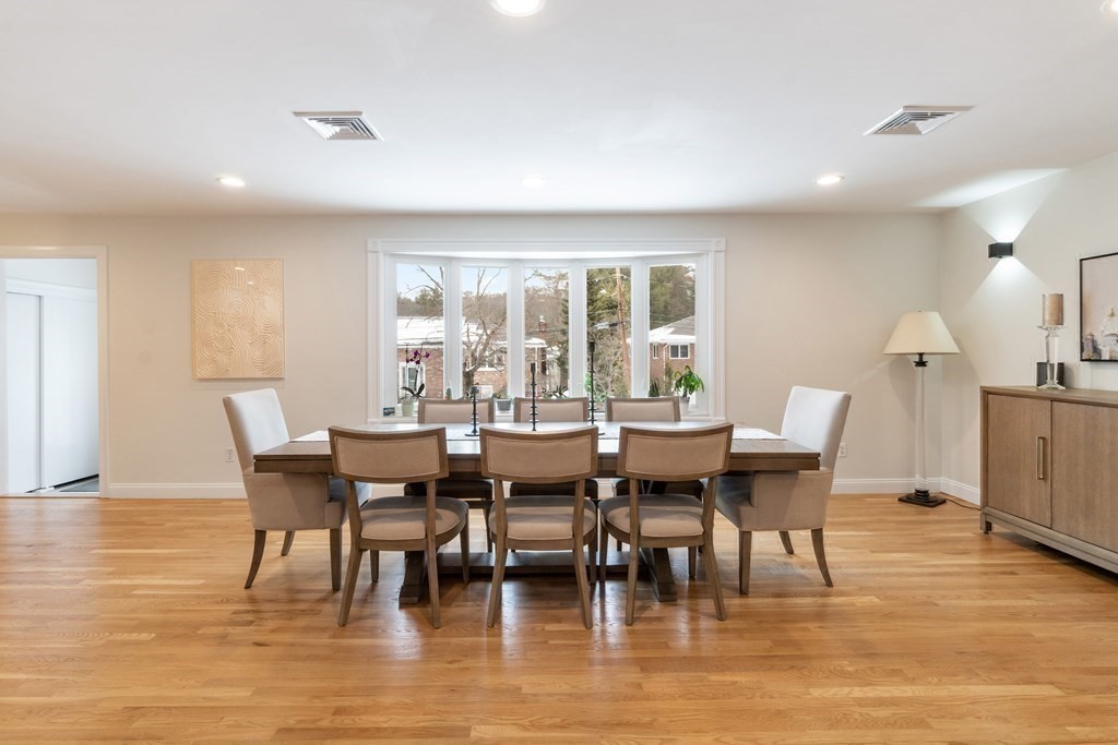 51 Donna Road Newton, MA 02459 - Photo 7 of 30 a view of a dining room with furniture window and wooden floor