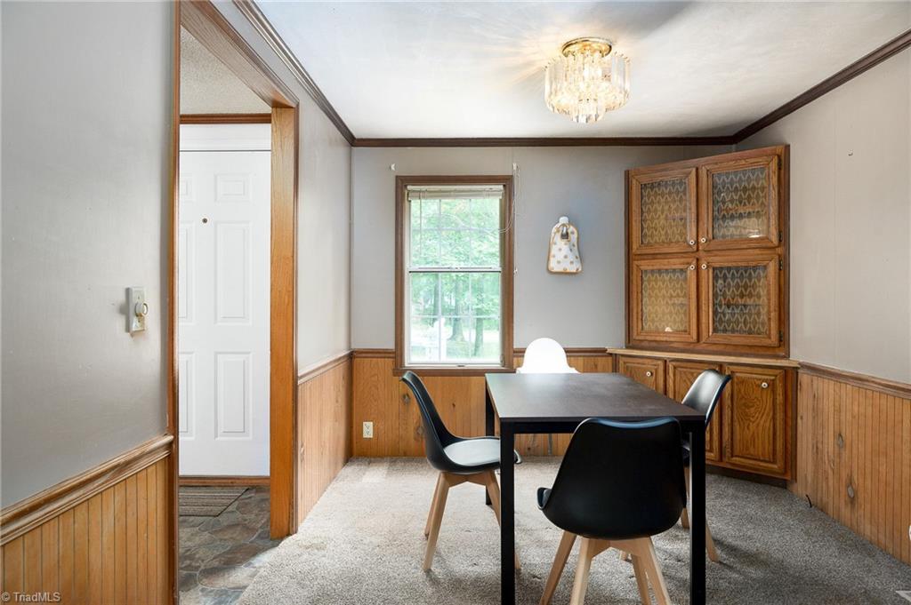 2103 Millcroft Road Pleasant Garden, NC 27313 - Photo 11 of 27 Dining room or flex room with built in corner cabinet is great for storage
