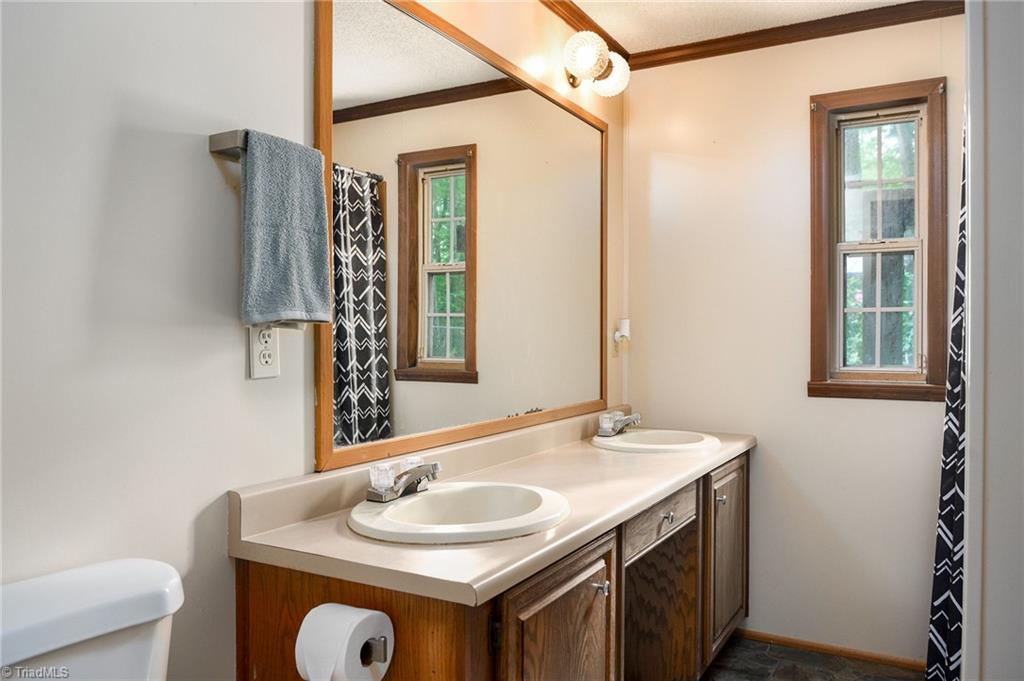 2103 Millcroft Road Pleasant Garden, NC 27313 - Photo 20 of 27 2nd bathroom features dual vanity