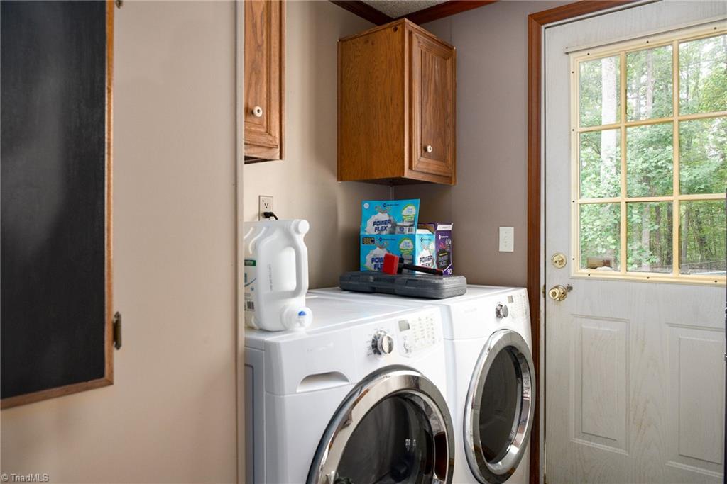 2103 Millcroft Road Pleasant Garden, NC 27313 - Photo 21 of 27 Separate laundry room/mud room. Washer and dryer stay with the home.