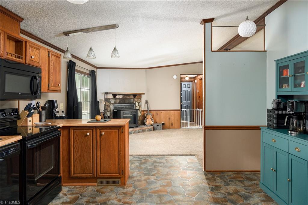2103 Millcroft Road Pleasant Garden, NC 27313 - Photo 9 of 27 Large kitchen has room for island or hutch