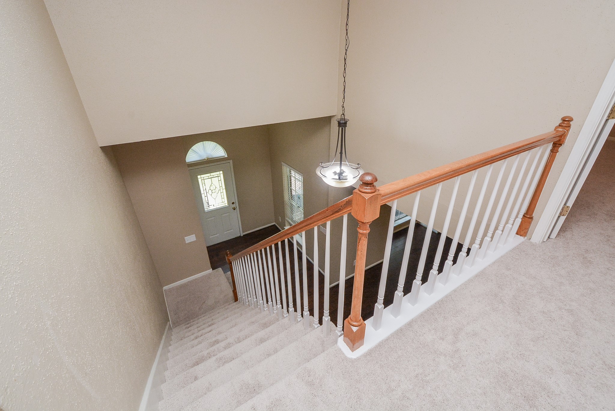 10 Ridgecross Place Spring, TX 77381 - Photo 15 of 32 a view of a hallway with stairs