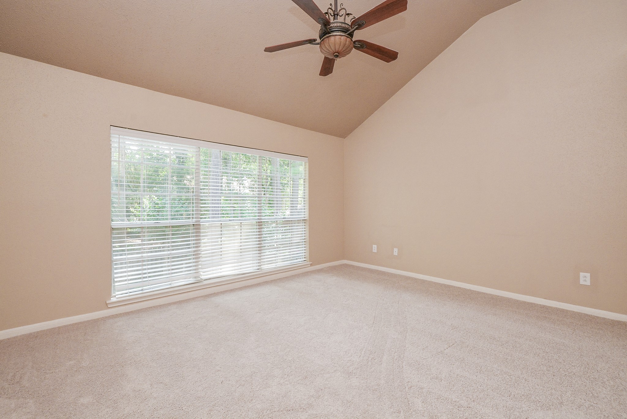 10 Ridgecross Place Spring, TX 77381 - Photo 16 of 32 a view of an empty room with a window