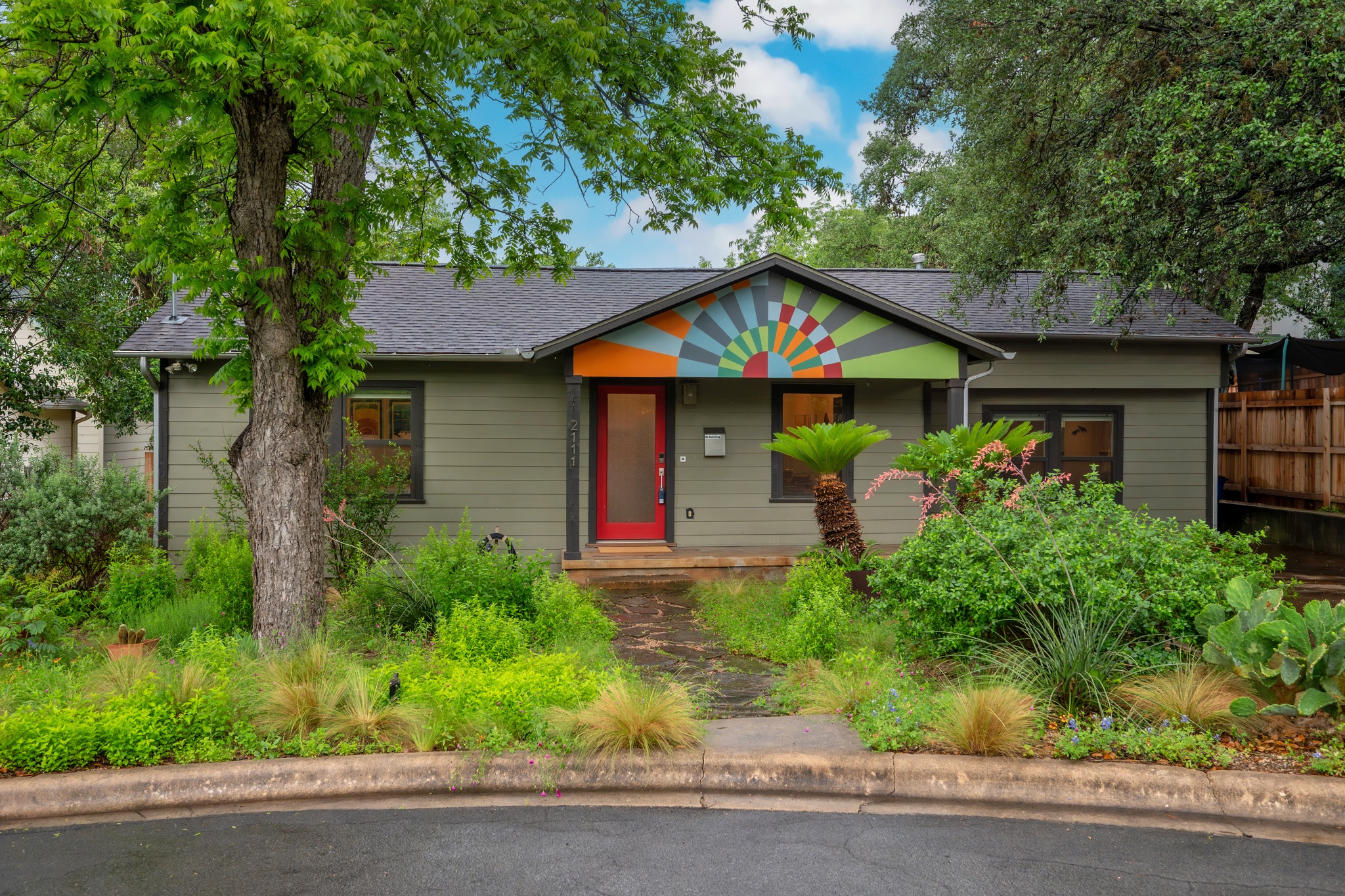 2111 Wright Street Austin, TX 78704 - Photo 1 of 30 a front view of a house with garden