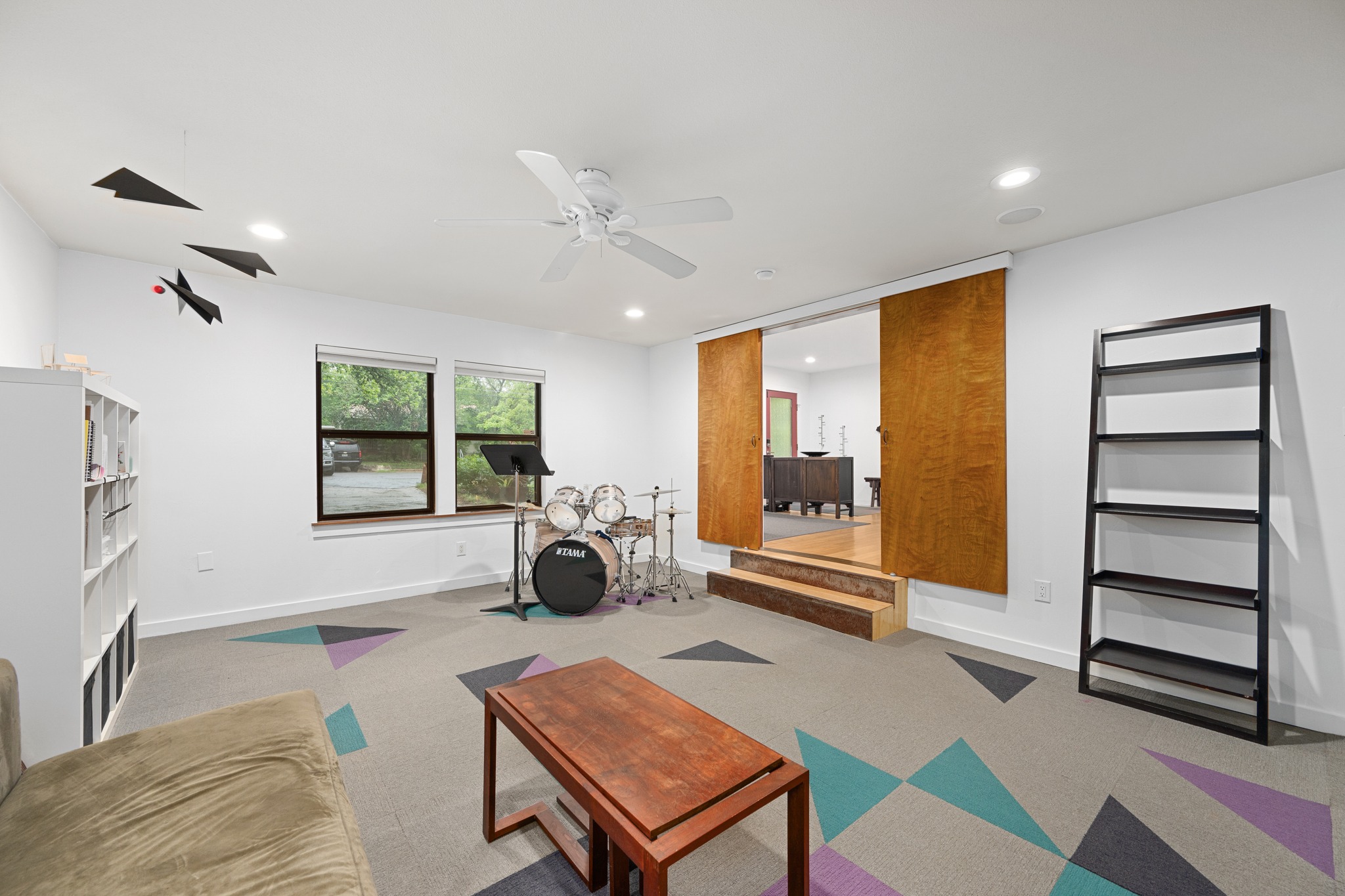 2111 Wright Street Austin, TX 78704 - Photo 12 of 30 a living room with furniture and a floor to ceiling window