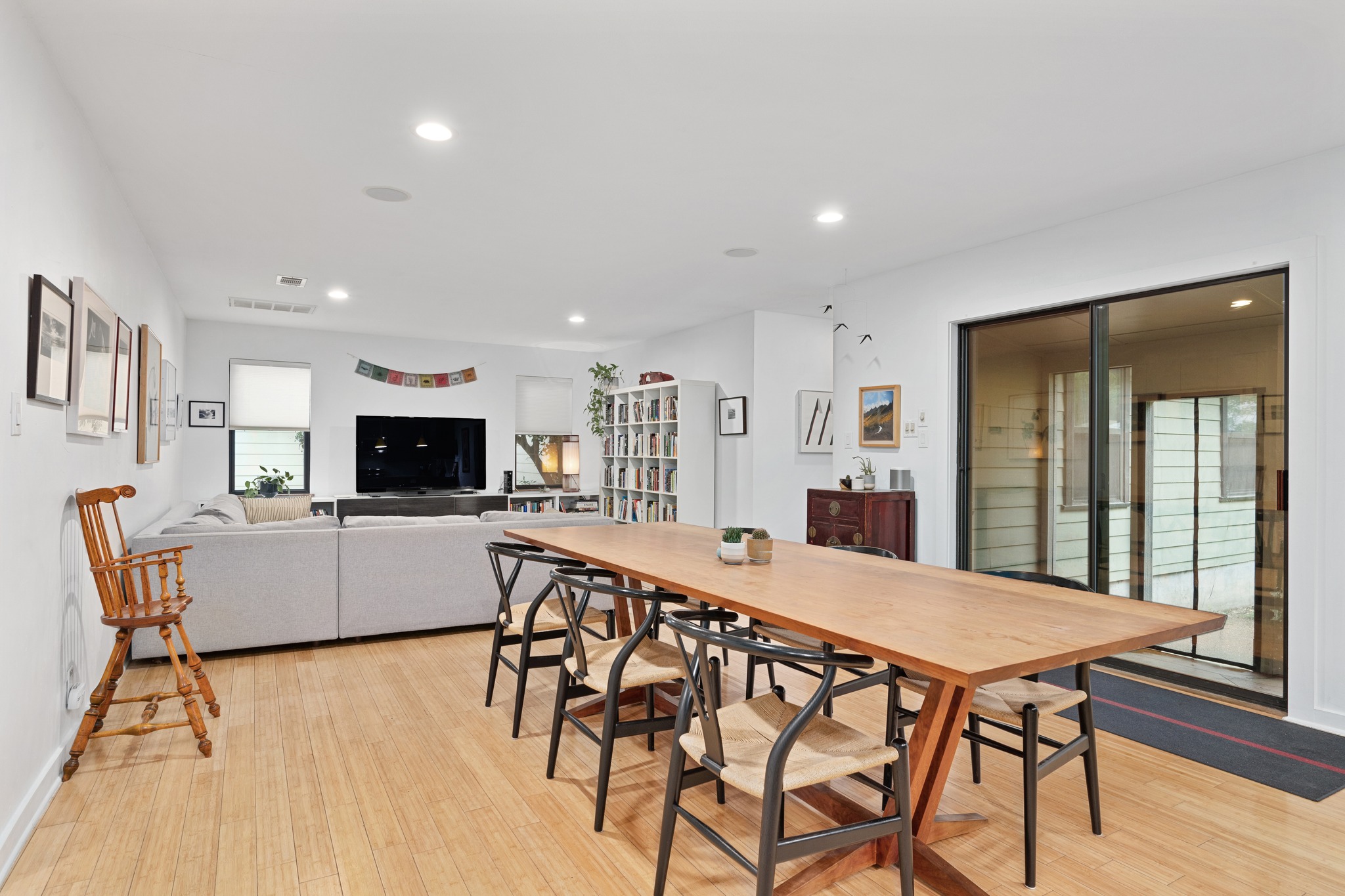 2111 Wright Street Austin, TX 78704 - Photo 13 of 30 a view of a dining room with furniture and wooden floor