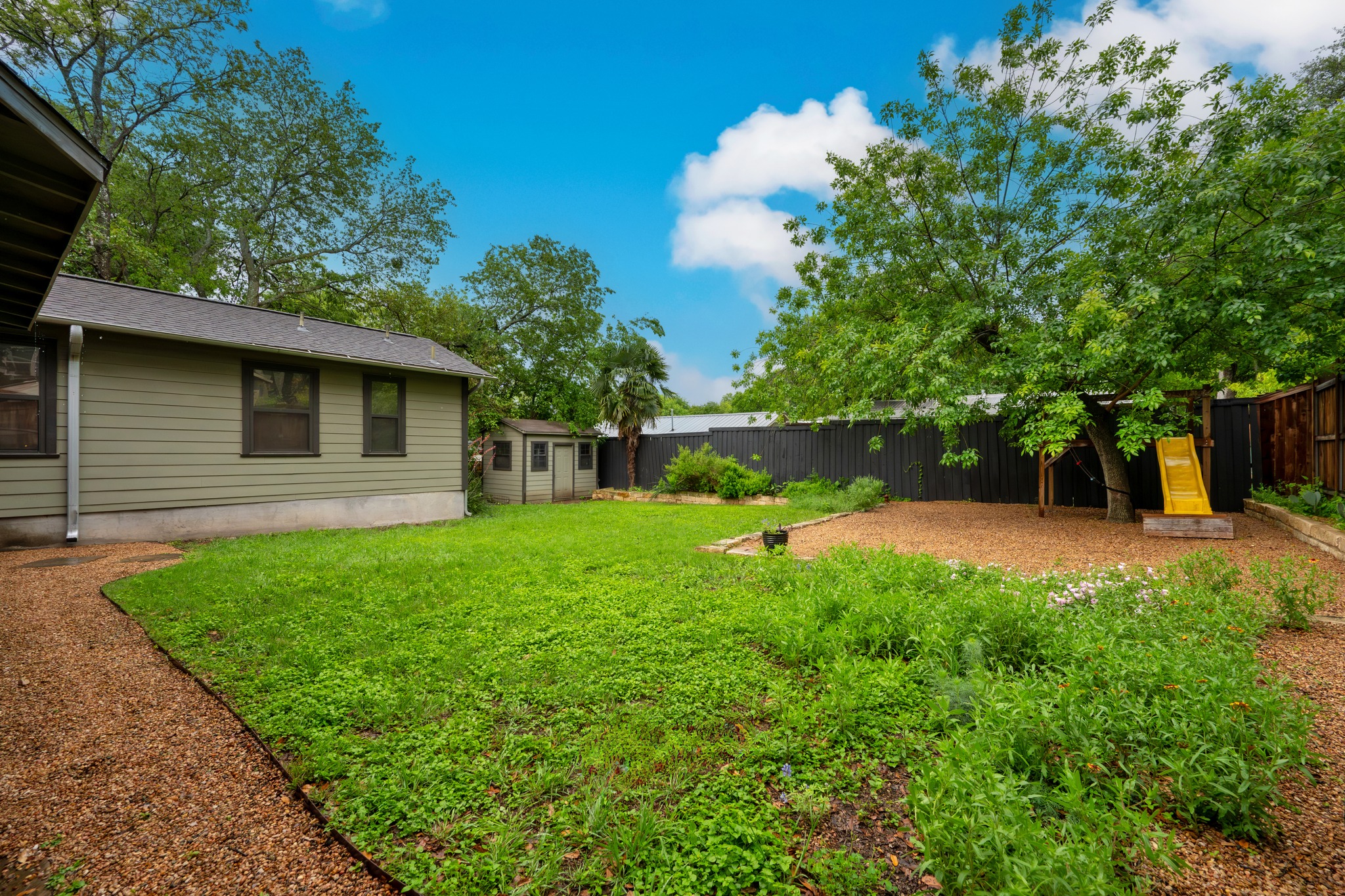 2111 Wright Street Austin, TX 78704 - Photo 27 of 30 a view of a backyard with a garden
