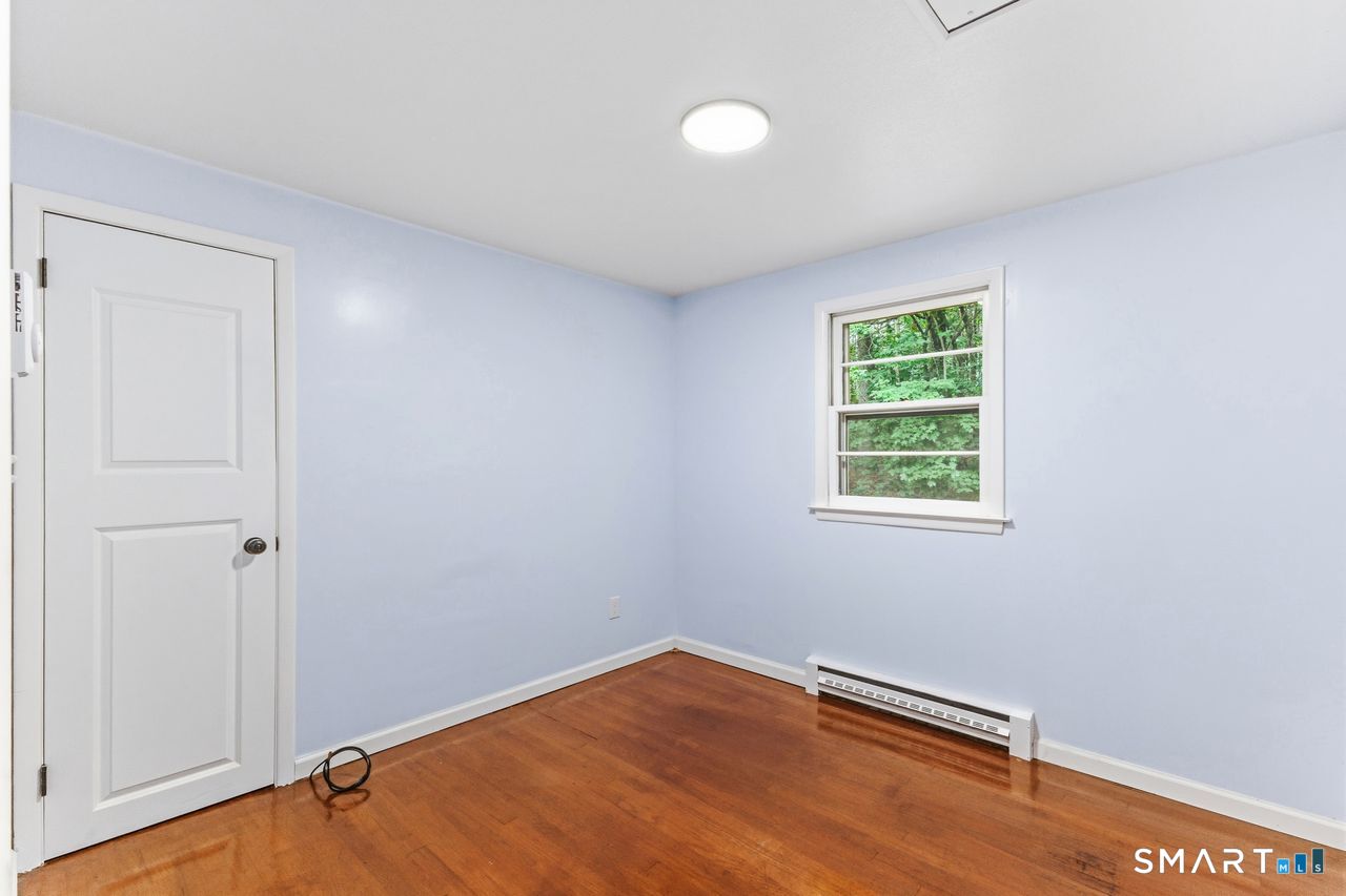 17 Rhoda Lane Bristol, CT 06010 - Photo 15 of 22 an empty room with a window