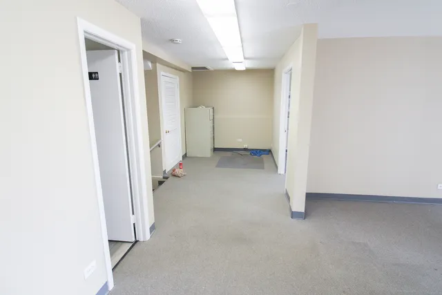 an empty room with a door