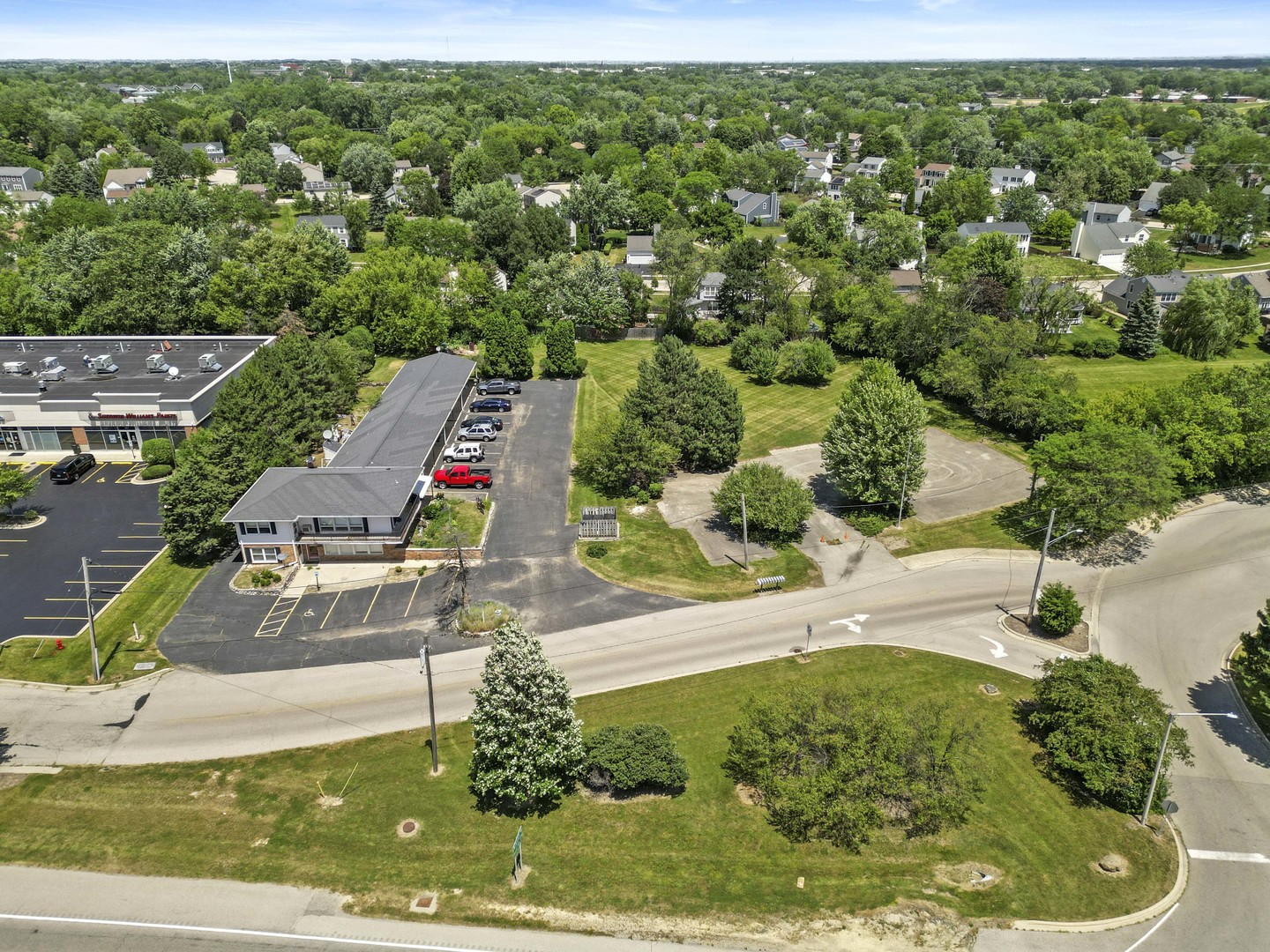 898 South Rand Road Lake Zurich, IL 60047 - Photo 2 of 18 an aerial view of residential houses with outdoor space and trees
