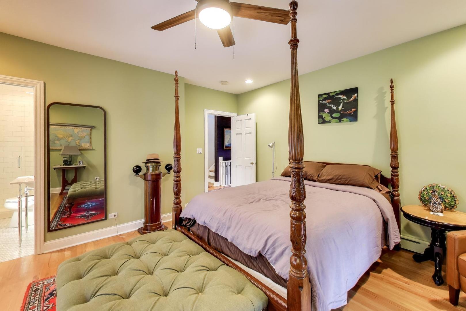 823 Jackson Avenue River Forest, IL 60305 - Photo 27 of 60 a bedroom with a bed and a mirror