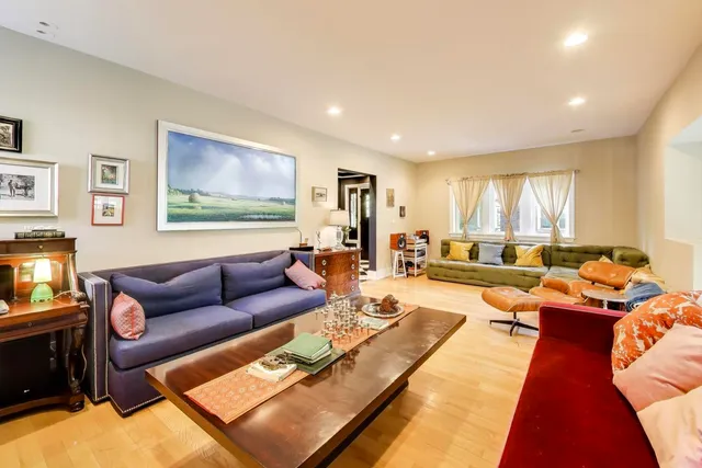 a living room with furniture and a couch