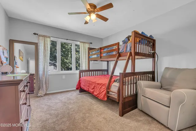 a bed room with a bed and a couch