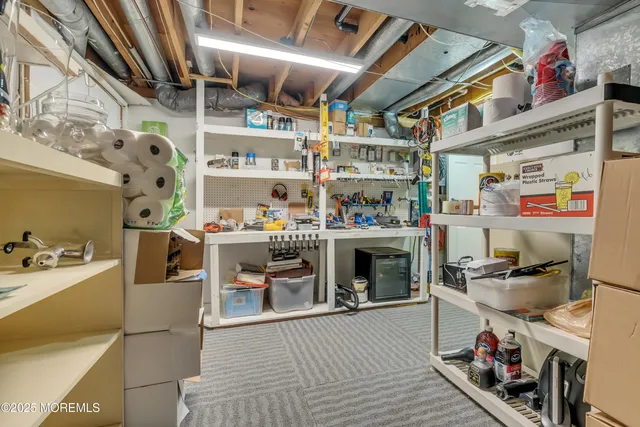 a storage room with washer and dryer