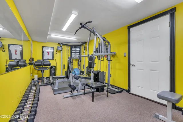 a room with musical instrument pool table and windows