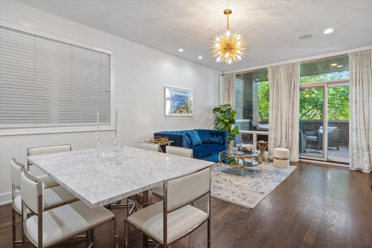 951 North Winchester Avenue, Unit 1 Chicago, IL 60622 - Photo 4 of 28 a view of a dining room with furniture window and outside view