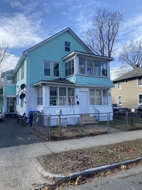 76-78 Ardmore Street Springfield, MA 01104 - Photo 2 of 20 a front view of a house with a yard