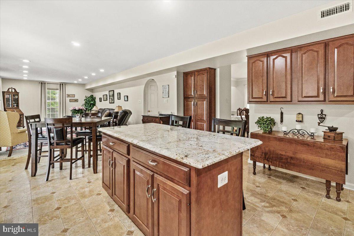 2218 West Greenleaf Drive Frederick, MD 21702 - Photo 16 of 46 a view of kitchen island with stainless steel appliances granite countertop lots of counter top space