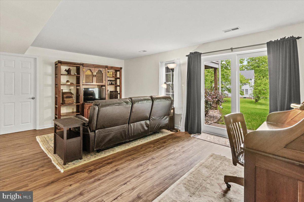 2218 West Greenleaf Drive Frederick, MD 21702 - Photo 22 of 46 a bed room with a bed and a chair